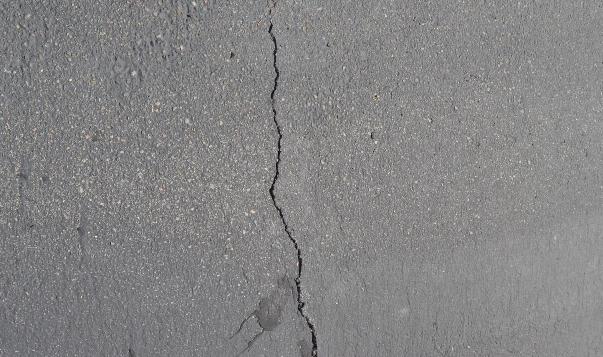 why asphalt cracks