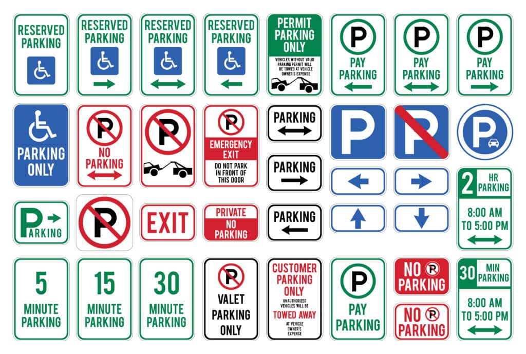 several different types of typical parking lot signs