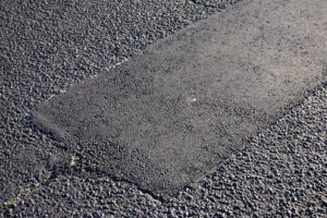 DIY Asphalt Patch Repair vs. Professional Patching: What Property Owners Should Know